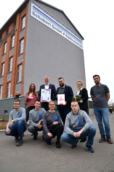 Group photo outside Schubert GmbH building